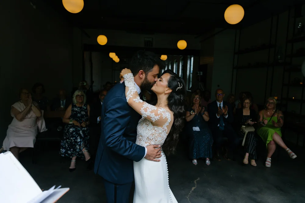 first-dance-couple-kiss-string-lights.jpg