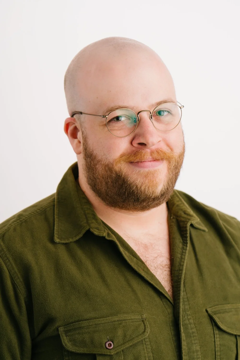 harry-bainbridge-headshot-glasses-olive-shirt-studio-headshots-nyc.jpg