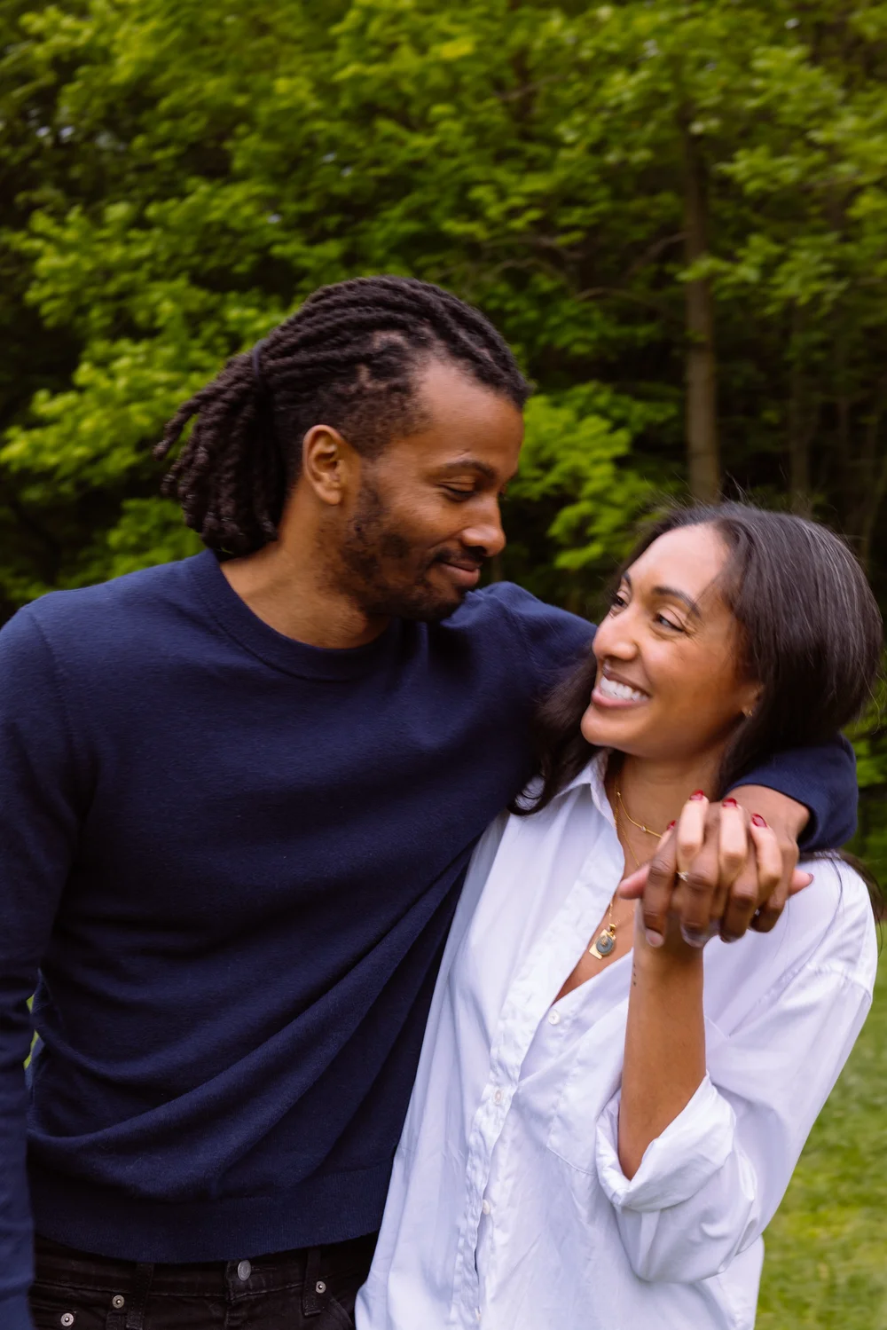 engagement-couple-arm-in-arm-trees.jpg
