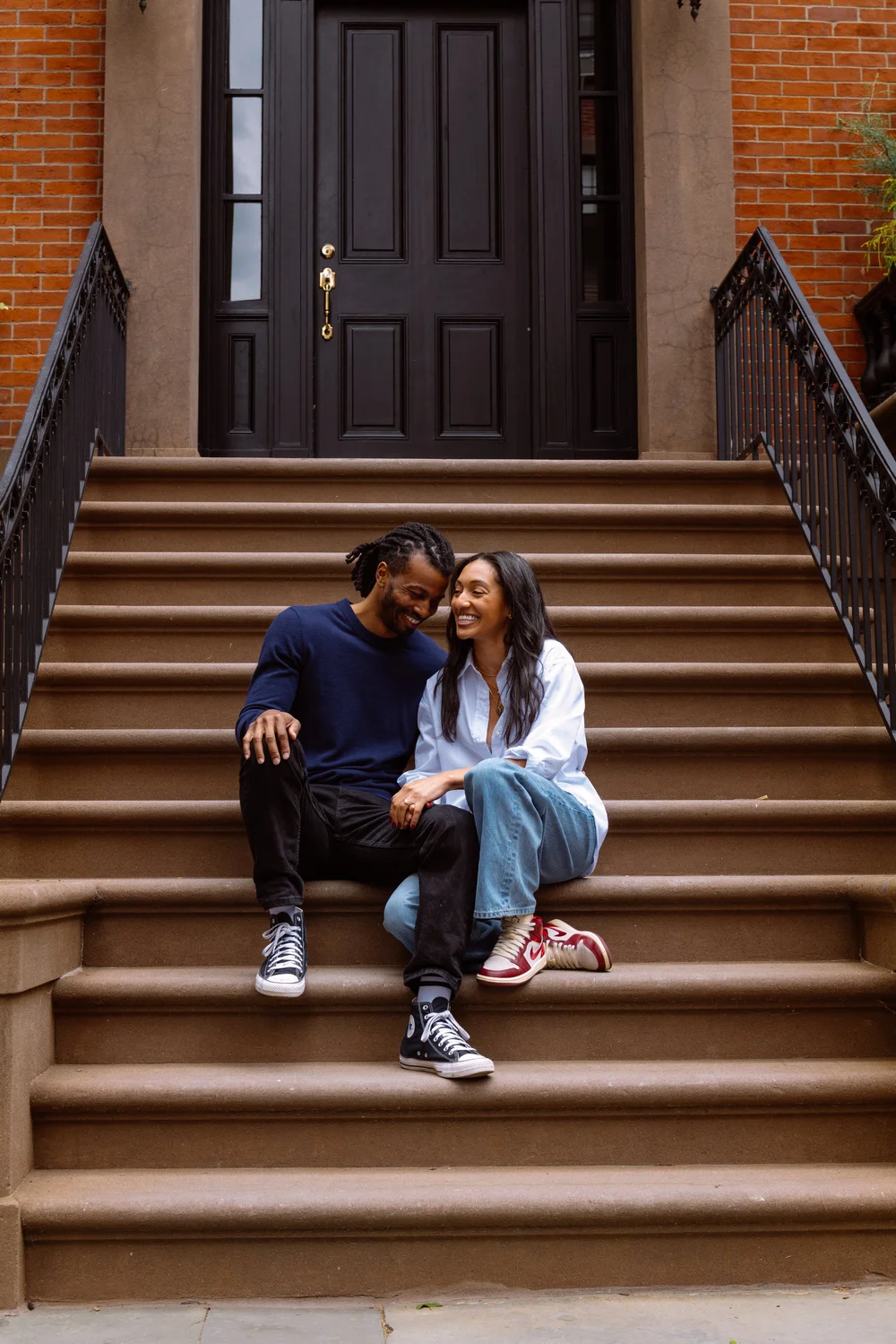 engagement-couple-brownstone-stoop.jpg