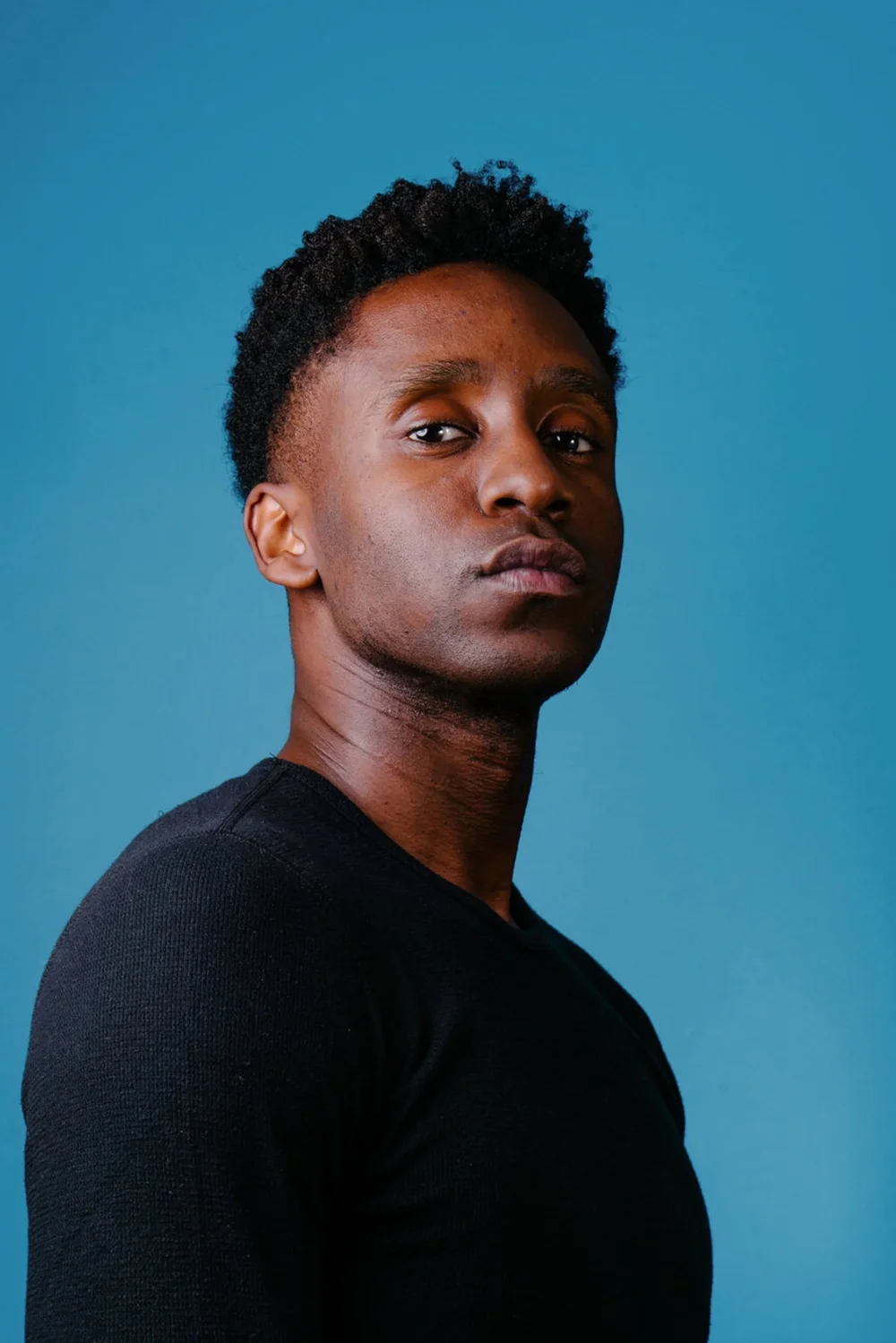 shawn-herbert-felton-portrait-blue-backdrop-headshot-photographer-nyc.jpg
