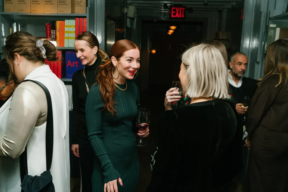trinny-london-vip-dinner-guests-mingling-bar.jpg