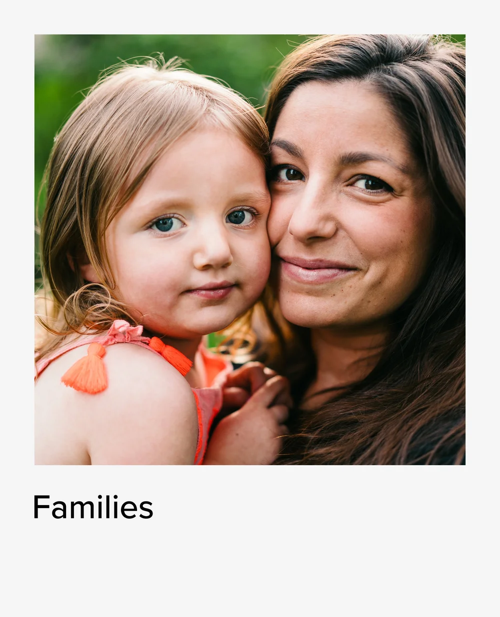Mother and toddler cheek to cheek, family photography in NYC
