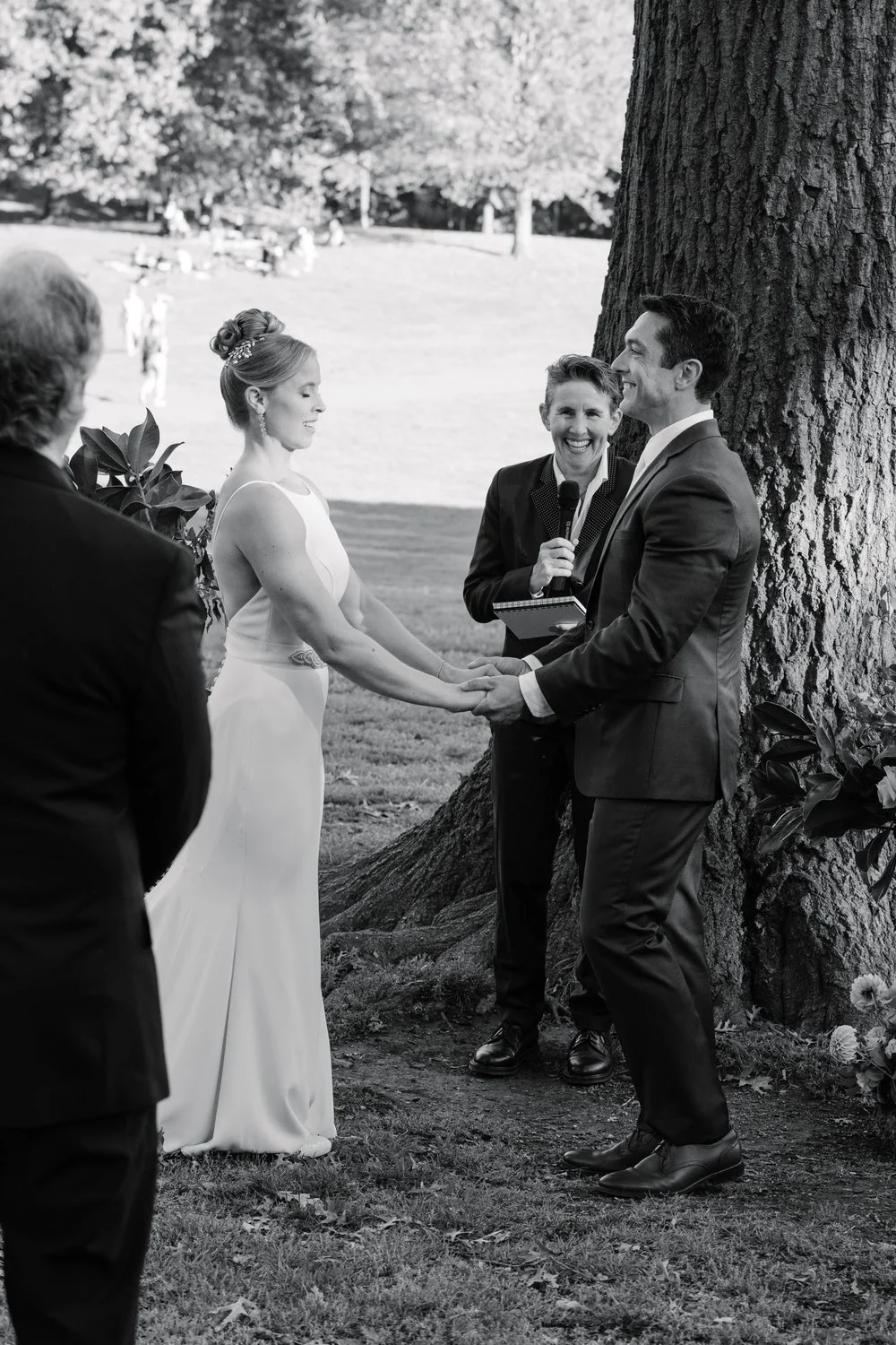 outdoor-wedding-vows-under-tree-black-and-white.jpg