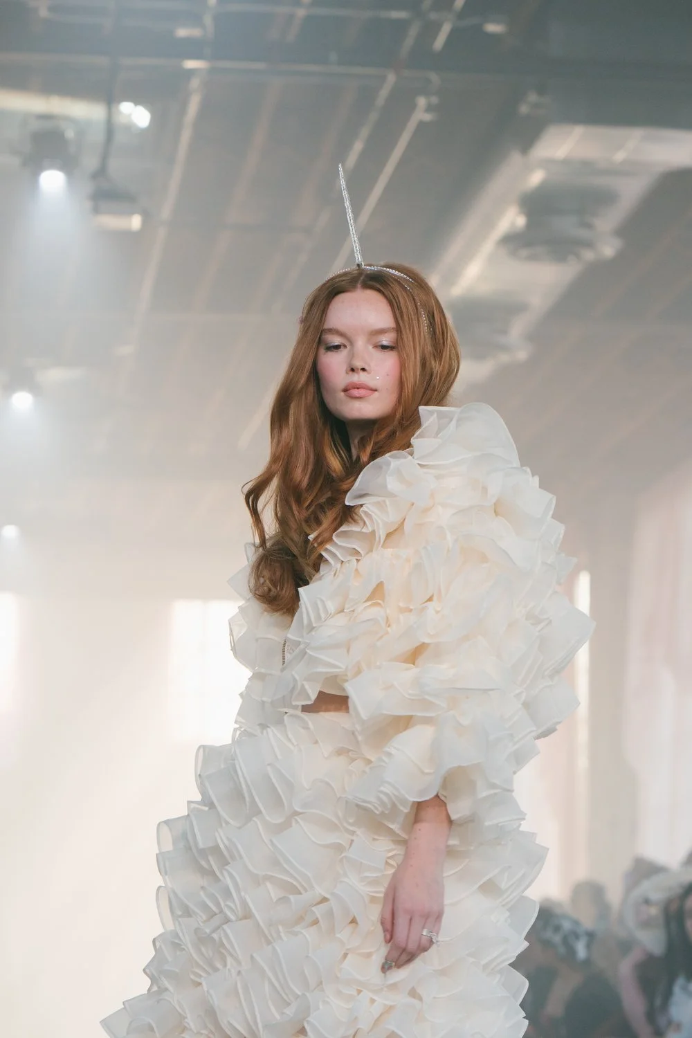 amika-selkie-nyfw-runway-voluminous-white-coat.jpg