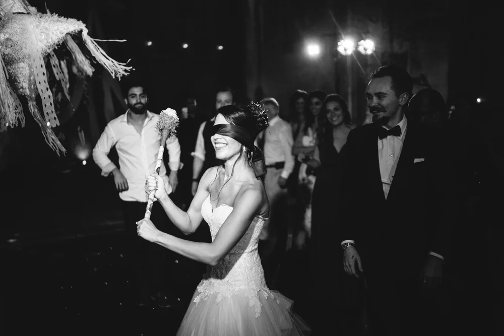 bride-dancing-reception-guests-black-and-white.jpg