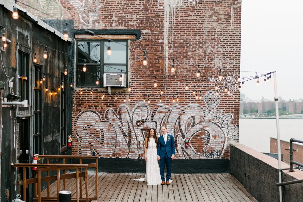 wedding-couple-rooftop-deck-graffiti-wall.jpg