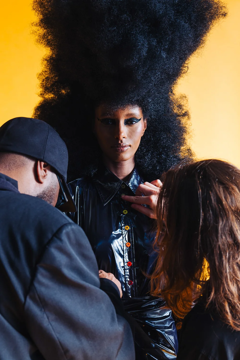texture-on-set-2024-model-yellow-backdrop-team.jpg
