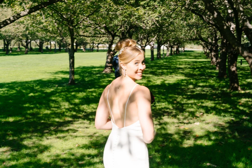 bride-walking-park-orchard.jpg
