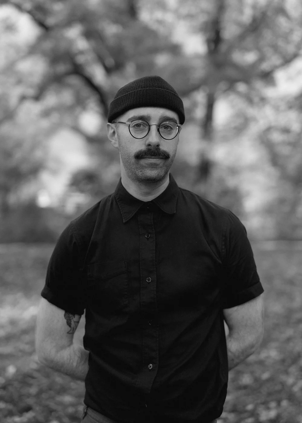 Black and white portrait of photographer Aaron Weiss
