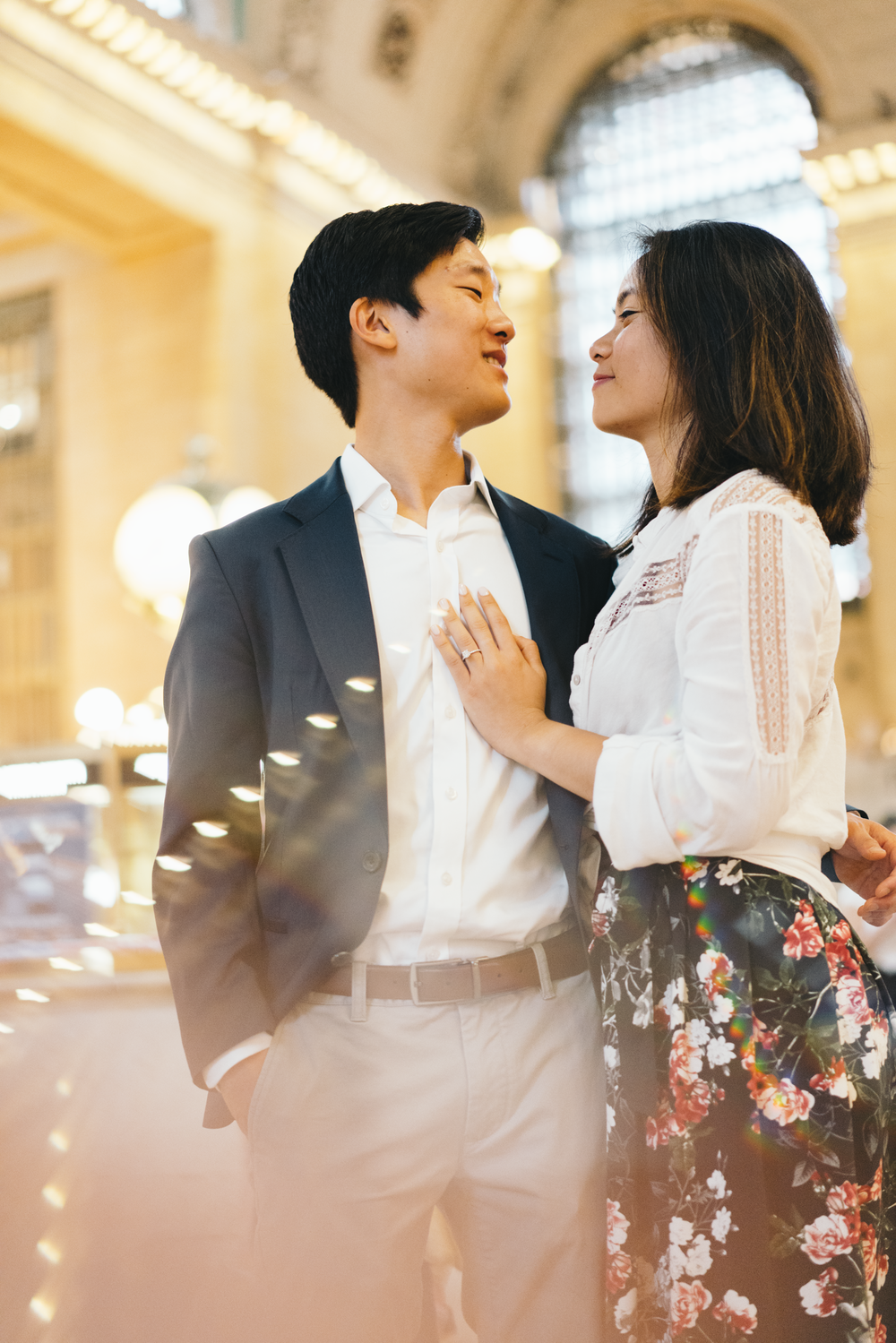 proposal-couple-smiling-grand-central.png