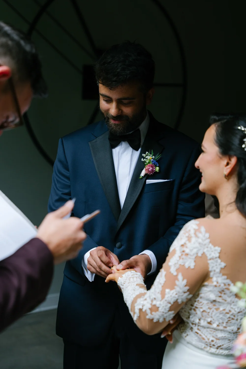 groom-placing-ring-bride-close-up.jpg