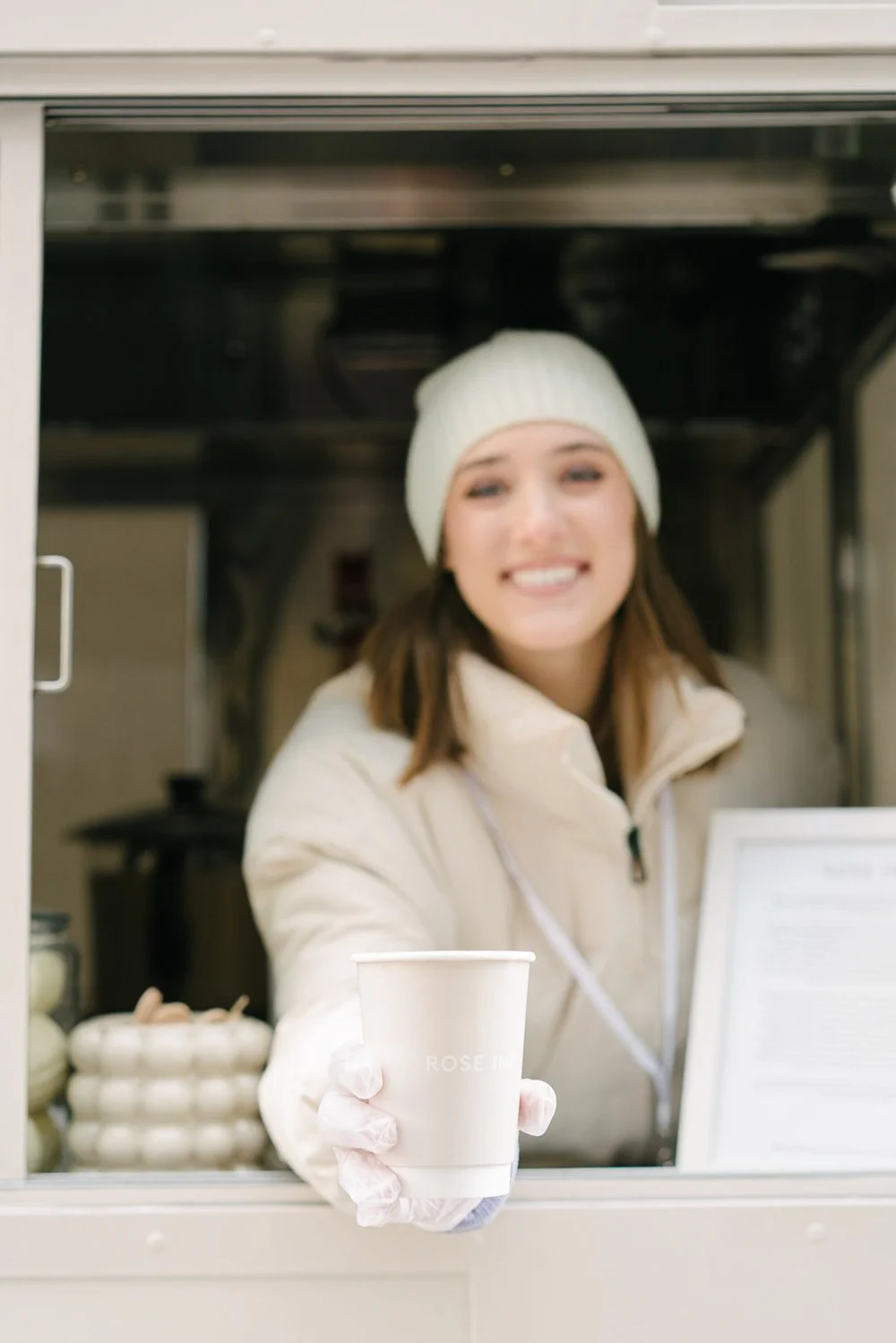 rose-inc-food-truck-staffer-smiling-window.jpg