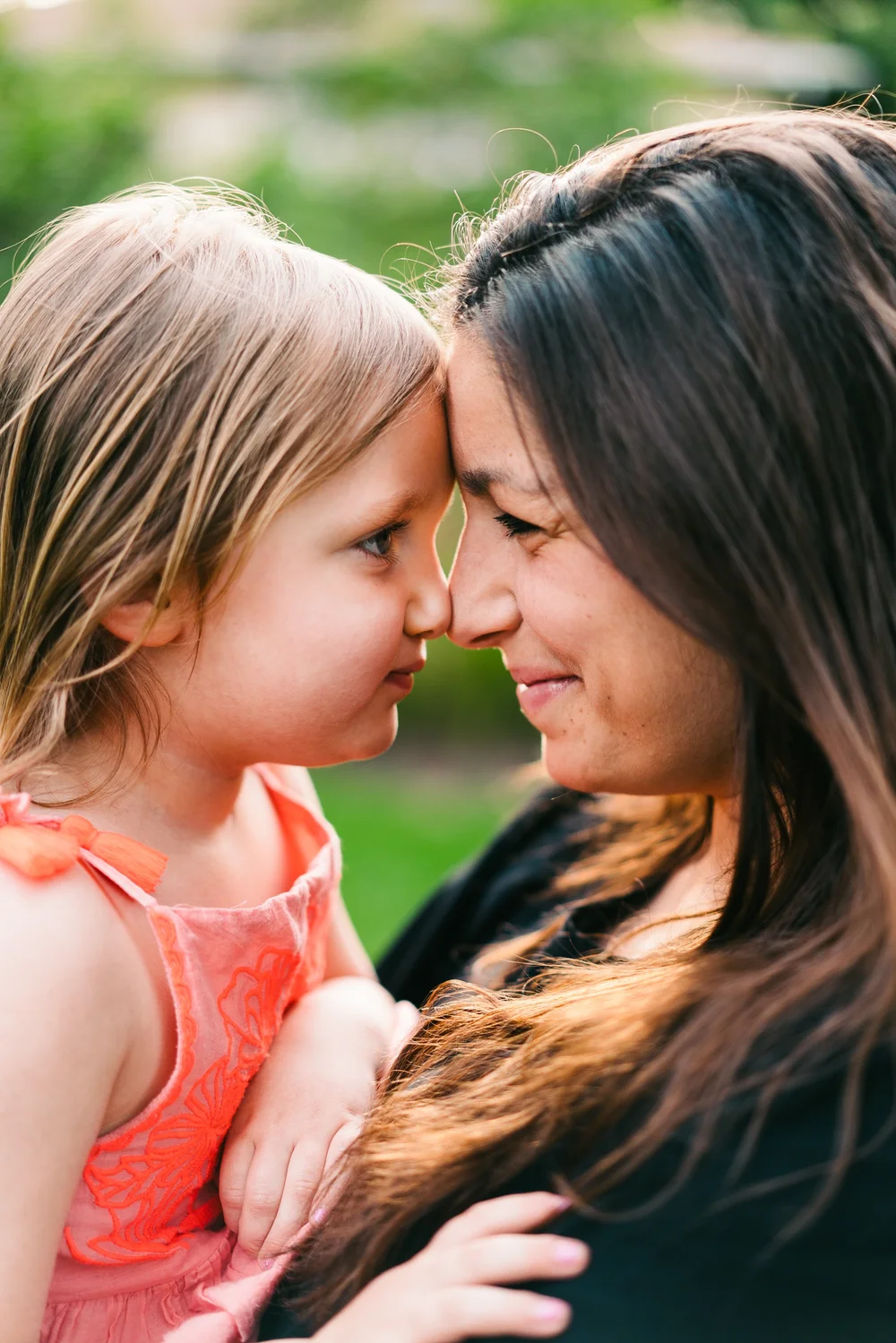 mother-daughter-foreheads-touching.jpg